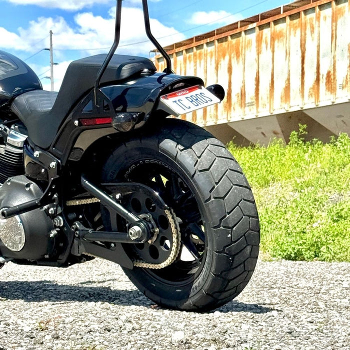 The TC Bros. Belt-to-Chain Drive Conversion Kit for 2018-Up Harley-Davidson Fat Bob includes two sprockets, gears, bolts, washers, and mounting hardware, all displayed on a white background.