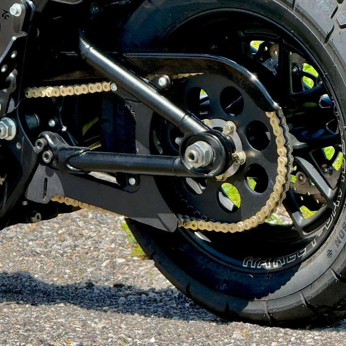 The TC Bros. Belt-to-Chain Drive Conversion Kit for 2018-Up Harley-Davidson Fat Bob includes two sprockets, gears, bolts, washers, and mounting hardware, all displayed on a white background.