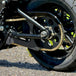 The TC Bros. Belt-to-Chain Drive Conversion Kit for 2018-Up Harley-Davidson Fat Bob includes two sprockets, gears, bolts, washers, and mounting hardware, all displayed on a white background.