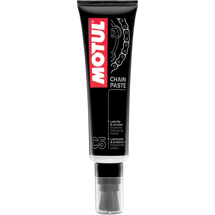 Black tube of Motul C5 Chain Paste with an integrated brush applicator for applying the lubricating paste.