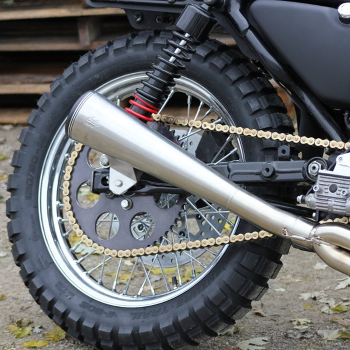 Burly Stiletto Shocks for 1986-2003 Harley-Davidson Sportster, including two black and red coil shocks, a metal spanner wrench, four bushings, four spacers, and a packet of lubricant.