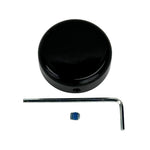 A round, black plastic object with a smooth, glossy finish and a small hole on its side—this Moto Iron® Steering Stem Bolt Cover for Harley-Davidson 39mm Narrowglide is photographed on a white background.