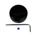 A round, black plastic object with a smooth, glossy finish and a small hole on its side—this Moto Iron® Steering Stem Bolt Cover for Harley-Davidson 39mm Narrowglide is photographed on a white background.