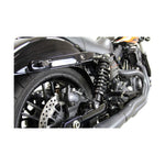 A close up of a black Legend Suspensions 13" Revo-A Coil Shocks 1999-2017 Harley Dyna motorcycle with a black exhaust.
