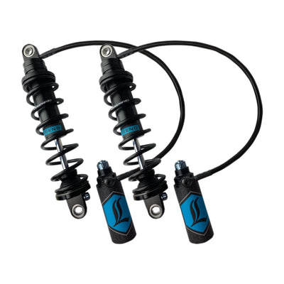 Set of four Legend Suspensions REVO ARC Remote Reservoir Shocks for a vehicle's suspension system.