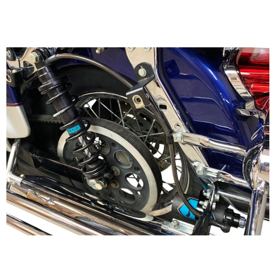 A set of four REVO ARC Remote Reservoir Shocks with standard springs in black, designed for '99-08 FL Touring models by Legend Suspensions, with blue accents and connected hydraulic lines.