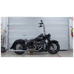 The Burly Slammer Lowering Shock for 2018-Up Harley-Davidson Softail features a coiled spring and "Burly" logo on the lower cylinder, shown here in black against a white background.