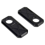 Two black and two silver rectangular plates with X-pattern engraving, plus two Handlebar Riser Bushings from the TC Bros. Handlebar Riser Bushing Conversion Kit, are arranged on a white background.
