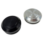 Two round metal TC Bros. Steering Stem Nut Covers for Pro Series Top Triple Tree Clamp, one black and one silver, rest side by side on a plain white background.