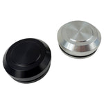 Two round metal TC Bros. Steering Stem Nut Covers for Pro Series Top Triple Tree Clamp, one black and one silver, rest side by side on a plain white background.