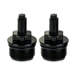 Two black metal Moto Iron Preload Adjusters for Harley-Davidson 39mm forks, featuring hexagonal tops and threaded bases.