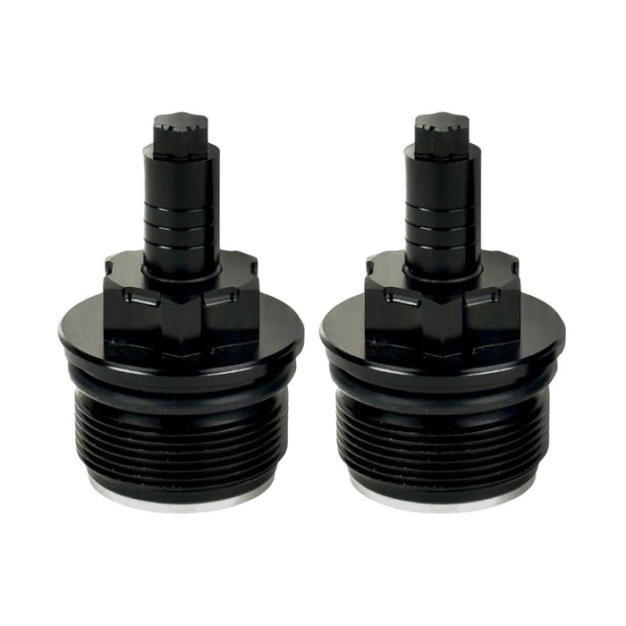 Two black metal Moto Iron Preload Adjusters for Harley-Davidson 39mm forks, featuring hexagonal tops and threaded bases.