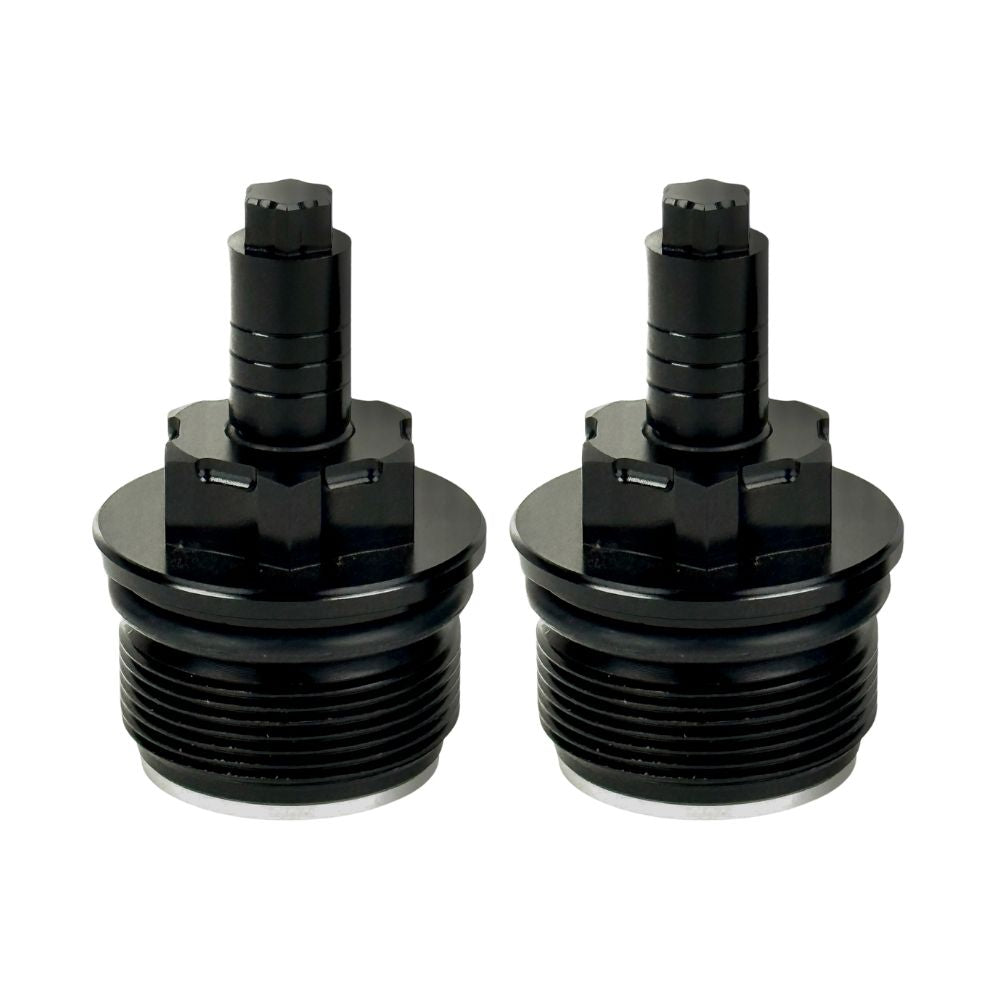 Two black metal Moto Iron Preload Adjusters for Harley-Davidson 39mm forks, featuring hexagonal tops and threaded bases.
