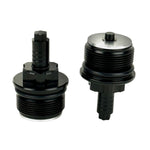 Two black metal Moto Iron Preload Adjusters for Harley-Davidson 39mm forks, featuring hexagonal tops and threaded bases.