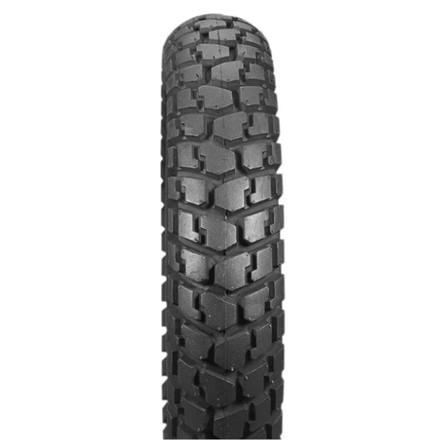 Bicycle tire with a Duro HF904 Median - Rear - 130/90-16 - 67S off-road tread pattern against a white background.