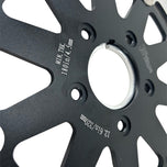 A TC Bros. 12.6in Oversized Front Floating Brake rotor for Harley Models, showcasing its corrosion resistance, placed against a white background.