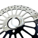 A Moto Iron® King Spoke 11.5" REAR Brake Rotor Harley Softail, Touring, Dyna, & Sportster 84-23 Polished on a white background.