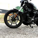 The TC Bros. Profile™ Front Floating Brake Rotor, compatible with 2023+ Harley Touring Bagger and 2021+ Pan America models, features a perforated round design crafted from high-carbon stainless steel with a black center and silver edge.