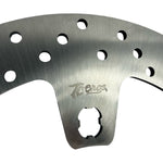 The TC Bros. 12.6in Oversized Front Floating Brake Rotor for 2014-2023 Harley Touring Models, featuring vent holes, is compatible with the TC Bros. Brake Caliper Adapter Kit.