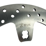 The TC Bros. 12.6in Oversized Front Floating Brake Rotor for 2014-2023 Harley Touring Models, featuring vent holes, is compatible with the TC Bros. Brake Caliper Adapter Kit.