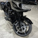 The TC Bros. Profile™ Front Floating Brake Rotor for 2024-up Harley Touring Bagger and 2021-up Pan America, crafted from stainless steel with edge holes and an irregular circular shape, mirrors the robust design of Harley Pan America&