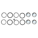 Ten black circles of varying sizes, a small black dot, and three metallic button-like objects arranged in two parallel rows reminiscent of Cycle Craft's Caliper Seal Kit and Pistons for V-rod, Sportster, and Big Twin models.