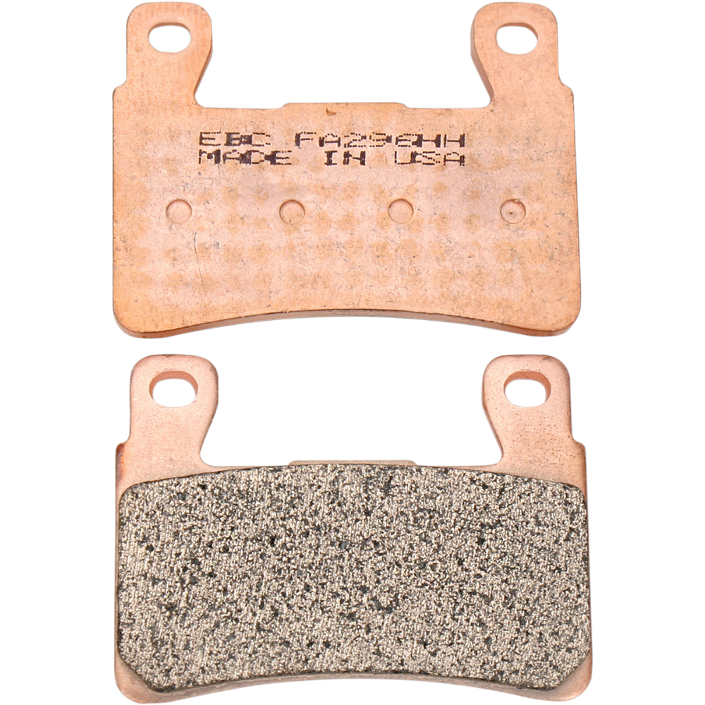 Two metallic EBC brake pads are shown, one featuring a text label and the other revealing the textured friction surface. Designed for 2015-2024 Harley-Davidson Softail, Sportster Roadster, and select metric applications, these EBC HH Fully Sintered Brake Pads provide exceptional stopping power and long-lasting durability.