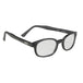 A pair of black-framed eyeglasses with clear lenses, labeled "KD XL Sunglasses - Clear" on the inside of the arm. Perfect for night riding or everyday use, these KD&