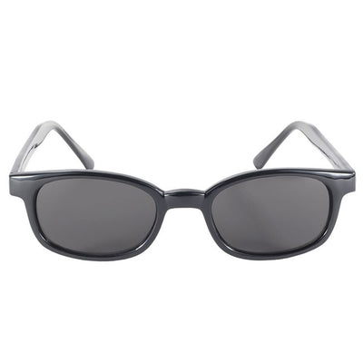 KD's XL Sunglasses - Smoke by KD's Sunglasses with dark lenses and a glossy finish, displayed on a white background. The frame is thick and solid, featuring slightly curved arms. Additionally, they offer UV protection to keep your eyes safe from the sun’s harsh rays.