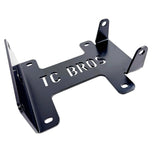 TC Bros. Engine Stand for 2000-2017 Harley-Davidson Twin Cam B Motor For Softail is a durable black metal bracket with multiple holes and "TC BROS" cutout, ideal for convenient engine maintenance. Photographed on a white background.