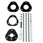 The TC Bros. Shock Spring Compressor for 2018-Up Harley-Davidson M8 Softail includes black metal spacers, bolts, washers, and nuts—perfect for safe shock absorber installation and maintenance.