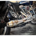 The SP Concepts Exhaust System for 1999-2005 Harley-Davidson Dyna is shown in black and silver, with an installed stainless steel version pictured below. Ideal for upgrading your Harley’s exhaust with SP Concepts style and quality.