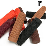 ODI Vans and Cult Grips for 1" handlebars feature a waffle pattern and come in black, brown, maroon, and orange. Textured rubber grips inspired by the Vans x CULT design are arranged on a white surface.