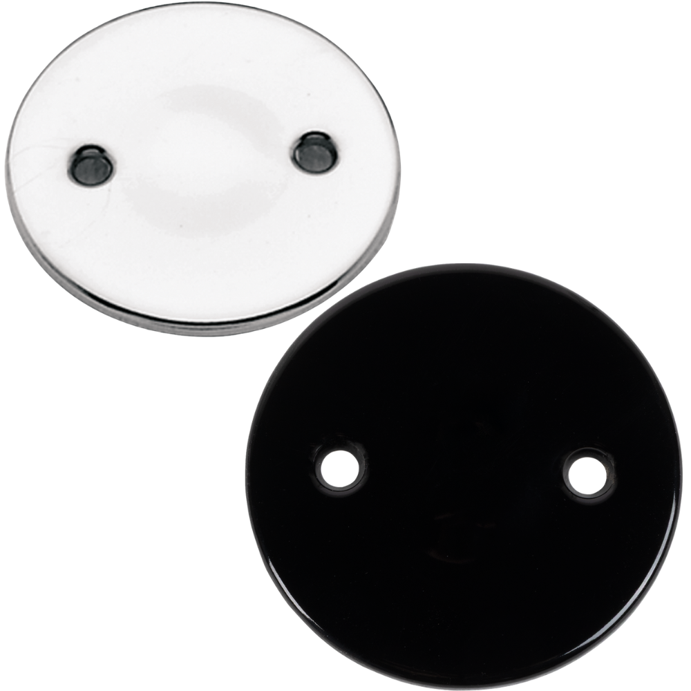The Paughco Inspection Cover for 1936-1964 Harley-Davidson Big Twin by Paughco, available in both white and black finishes with two signature holes reminiscent of a classic tin-type design, is shown diagonally arranged on a white background.