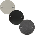 Three Drag Specialties Points Covers for 2017-2025 Harley-Davidson Big Twin motorcycles, each featuring two mounting holes, are displayed in silver, matte black, and textured black finishes. The round metal covers from Drag Specialties are arranged diagonally against a white background.