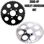 Pair of TC Bros. 48T Rear Sprockets for chain-driven (converted) Harley-Davidson 2000-up models—one black, one chrome. Both have six large circular cutouts and fit standard 530 chain setups.