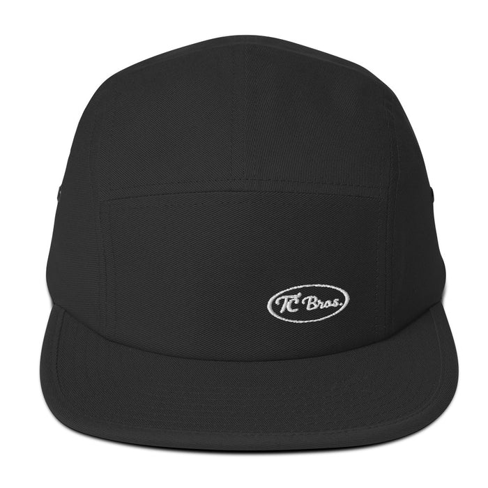 Pete Five Panel Cap - Black with a small TC Bros. logo on the front.