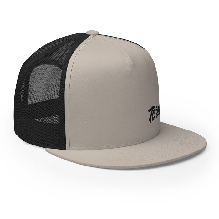 Beige and black TC Bros. Script Flat Bill Trucker Cap with "tecos" logo embroidery featuring snapback closure.