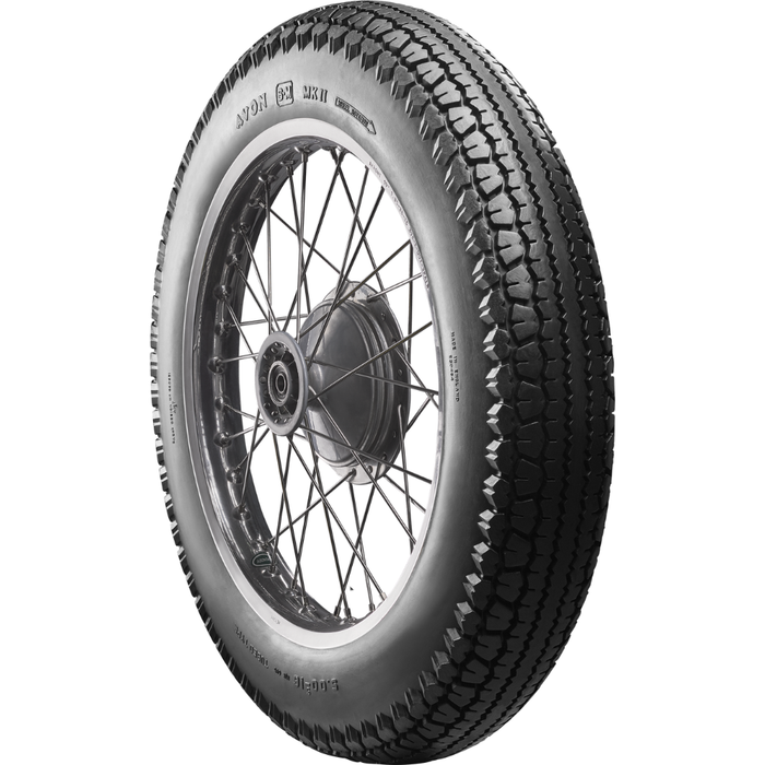 A classic block pattern tire, the Avon Tire - Safety Mileage Mark II AM7 - Rear - 4.00-18 - 64S by Avon, mounted on a spoked wheel.