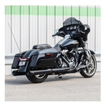 A black GNX SLIP-ONS for M8 TOURING MODELS - Black motorcycle parked in front of a building. Brand Name: S&S Cycle