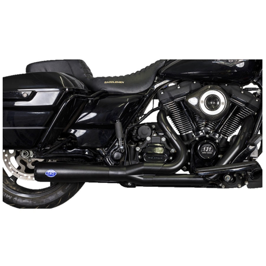A matte black S&S Cycle Diamondback 2-1 Exhaust System for 2017-2024 Harley-Davidson Touring with First Gen M8, featuring a curved design and mounting points, viewed from the side.