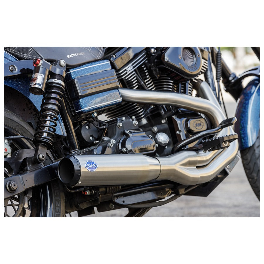 A close up of a Brushed Stainless Qualifier 2 into 1 Exhaust System for 2006-2017 Harley Davidson Dyna Models made by S&S Cycle.