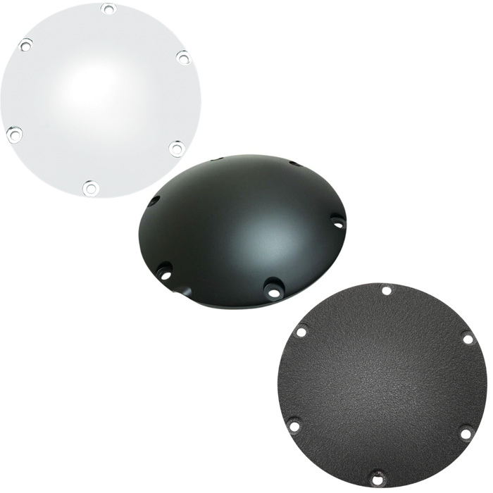 Three round metal plates, each featuring six holes—one in white, one in black, and one in dark gray—are displayed against a white background. These are Universal Derby Covers by Universal, designed to fit 2004-2022 Harley-Davidson Sportster models.