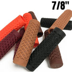ODI Vans and Cult Grips for 7/8" handlebars are shown in multiple colors with a waffle pattern, arrayed together. "7/8"" appears in bold at the top right, highlighting their size compatibility.