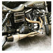 A black and silver motorcycle parked in a garage, featuring the Sawicki Speed Shorty 2 into 1 Pipe &
