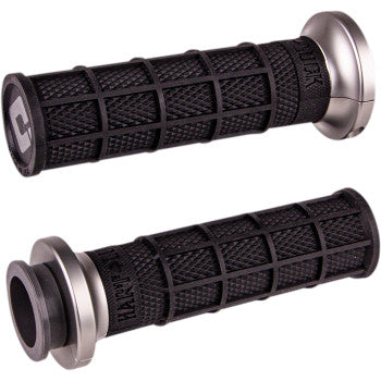 The Waffle Lock-On V-Twin Grips for Harley - Cable Throttle in Black/Graphite by ODI feature a textured pattern, providing both style and functionality.