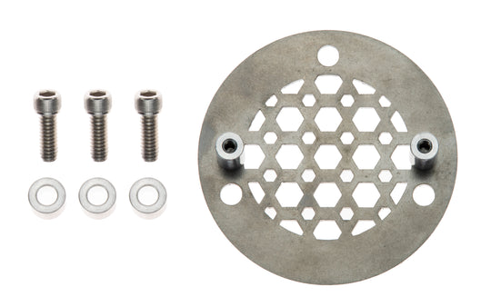 Close-up of a mechanical component featuring a "Pangor Cycles" branding on a circular metal plate. Various bolts, valves, and metal parts are visible, suggesting a part of an engine assembly, possibly connected to the Cheap Sucker Bird Catcher/Air Cleaner for S&S Super E Carburetors.