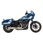 A blue and black cruiser motorcycle with white accents is shown in side profile on a white background, featuring the Bassani 2-into-1 Stainless Exhaust with Super Bike Muffler for 2018–2024 Harley-Davidson Low Rider ST, Heritage, and Sport Glide.
