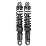 Two pairs of motorcycle shocks are shown: the top is Drag Specialties Premium Adjustable Height Shocks for 1980-2025 Harley-Davidson Touring in matte black; the bottom pair features chrome with black accents, ideal for Touring models.