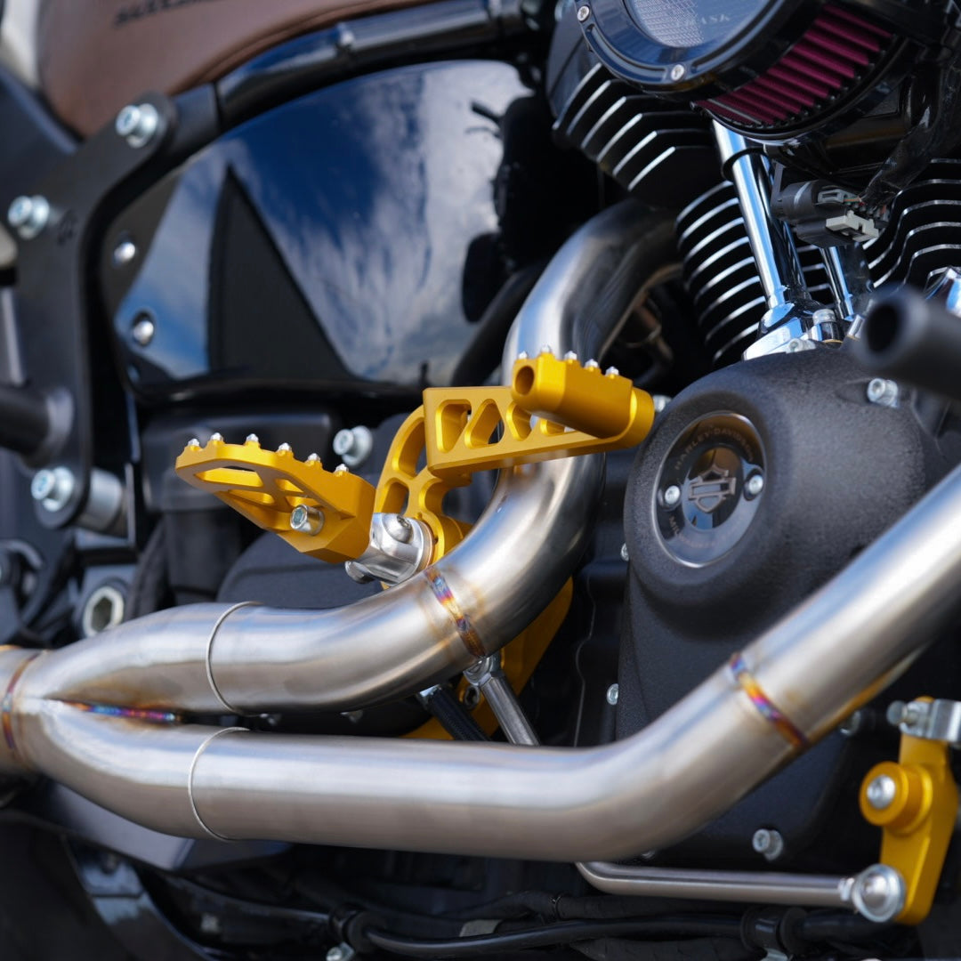 Honda cbr600rr with TC Bros. Pro Series Mid Controls, designed for maximum lean angle on the Harley Davidson Softail, are replaced by TC Bros. Pro Series Mid Controls fits 2018-newer M8 Softail Gold from the brand TC Bros.